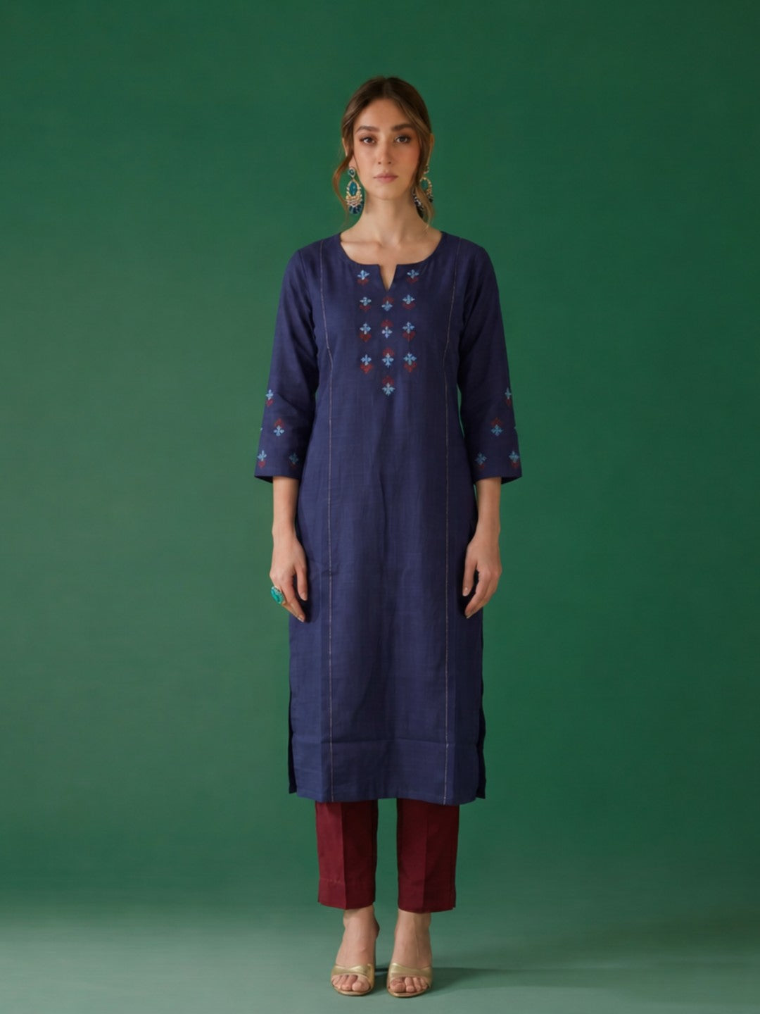 Straight fit cotton slurb kurta with shoulder princess Pannel, hand block print and sequin work.