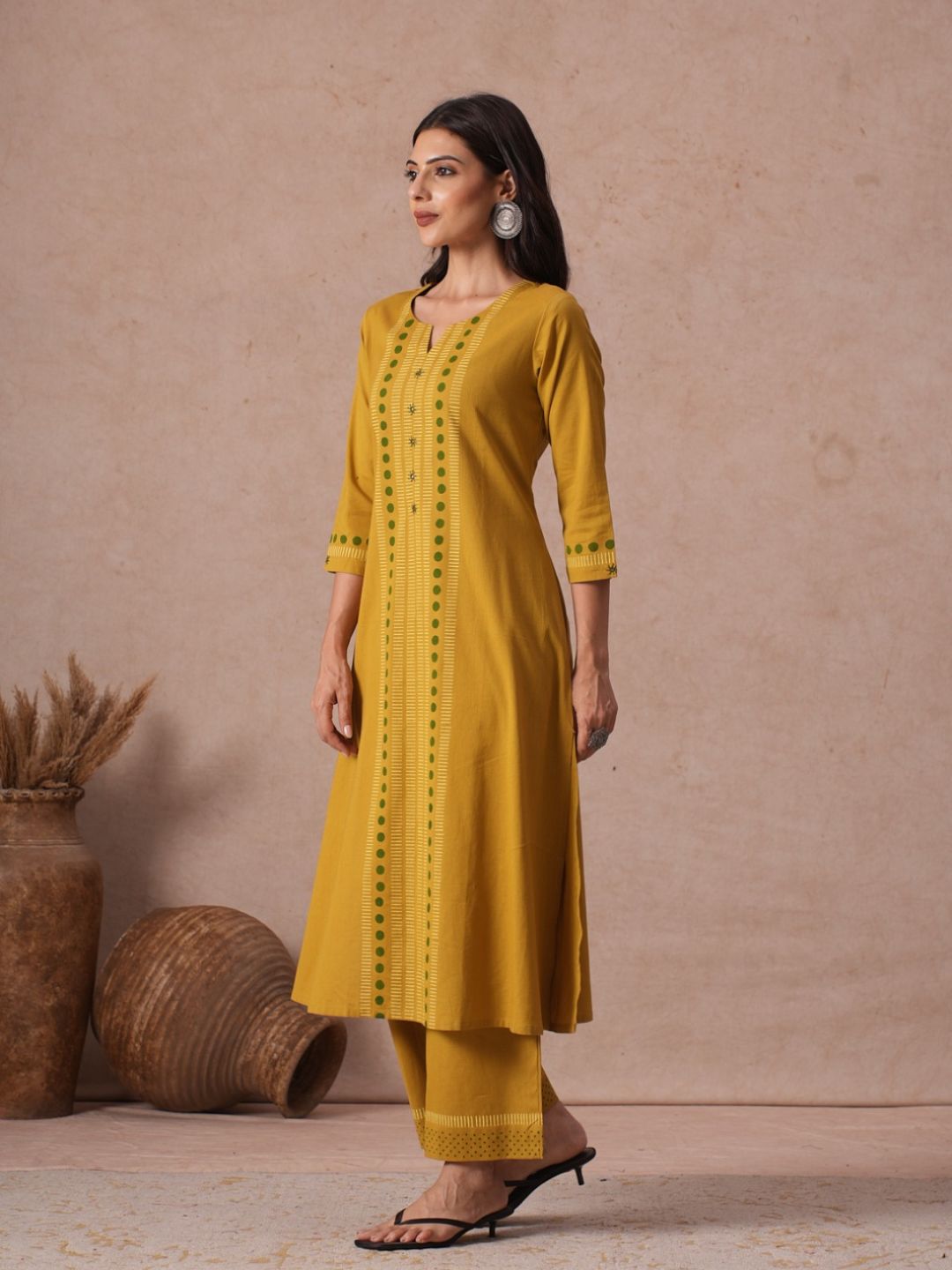 A-Line Cotton Flex Kurta with Hand Block Print and Mirror Work Detailing.