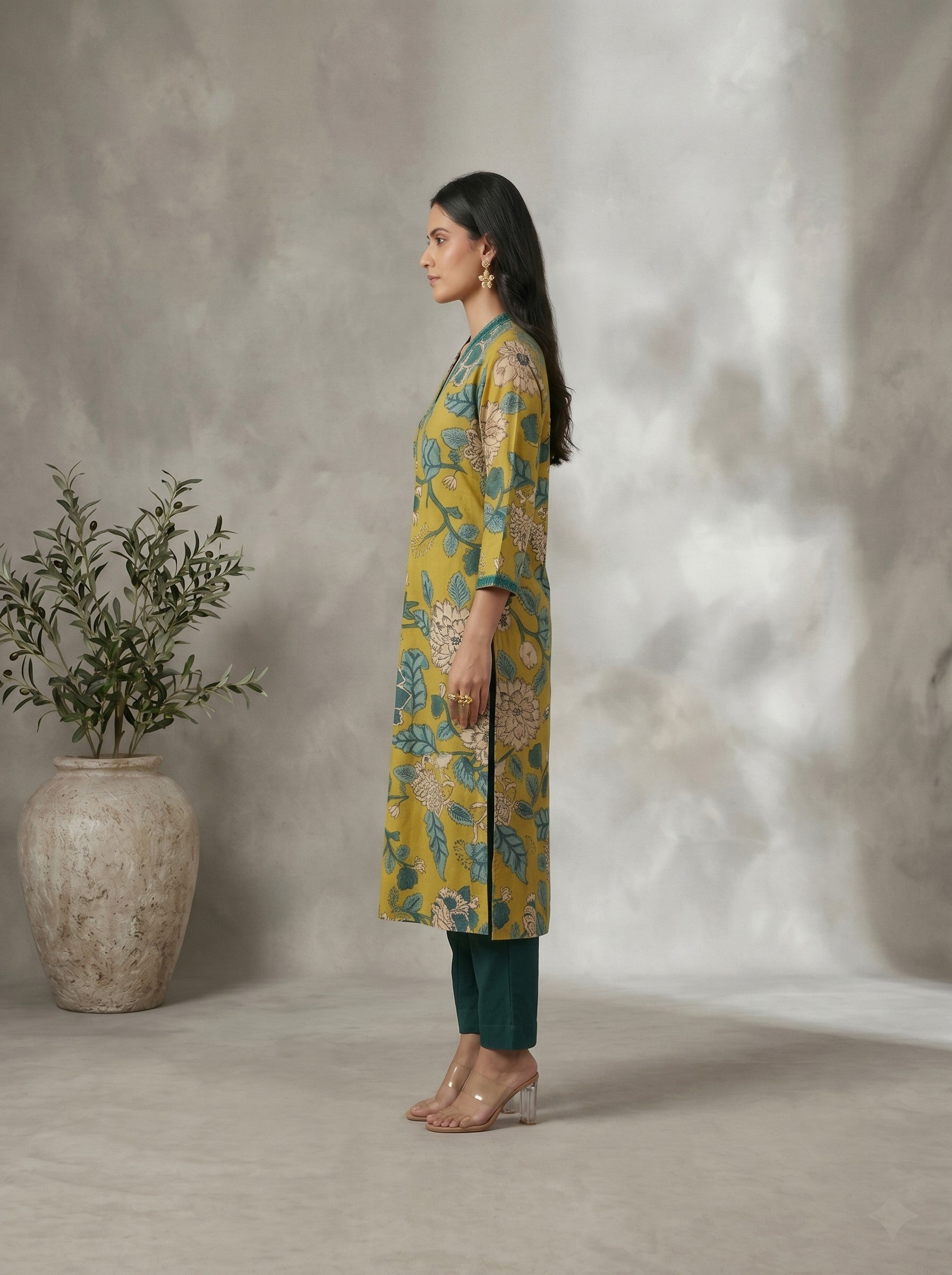 Mustard Floral Printed A-Line Cotton Kurta with Elegant V-Neck Mirror Detailing.