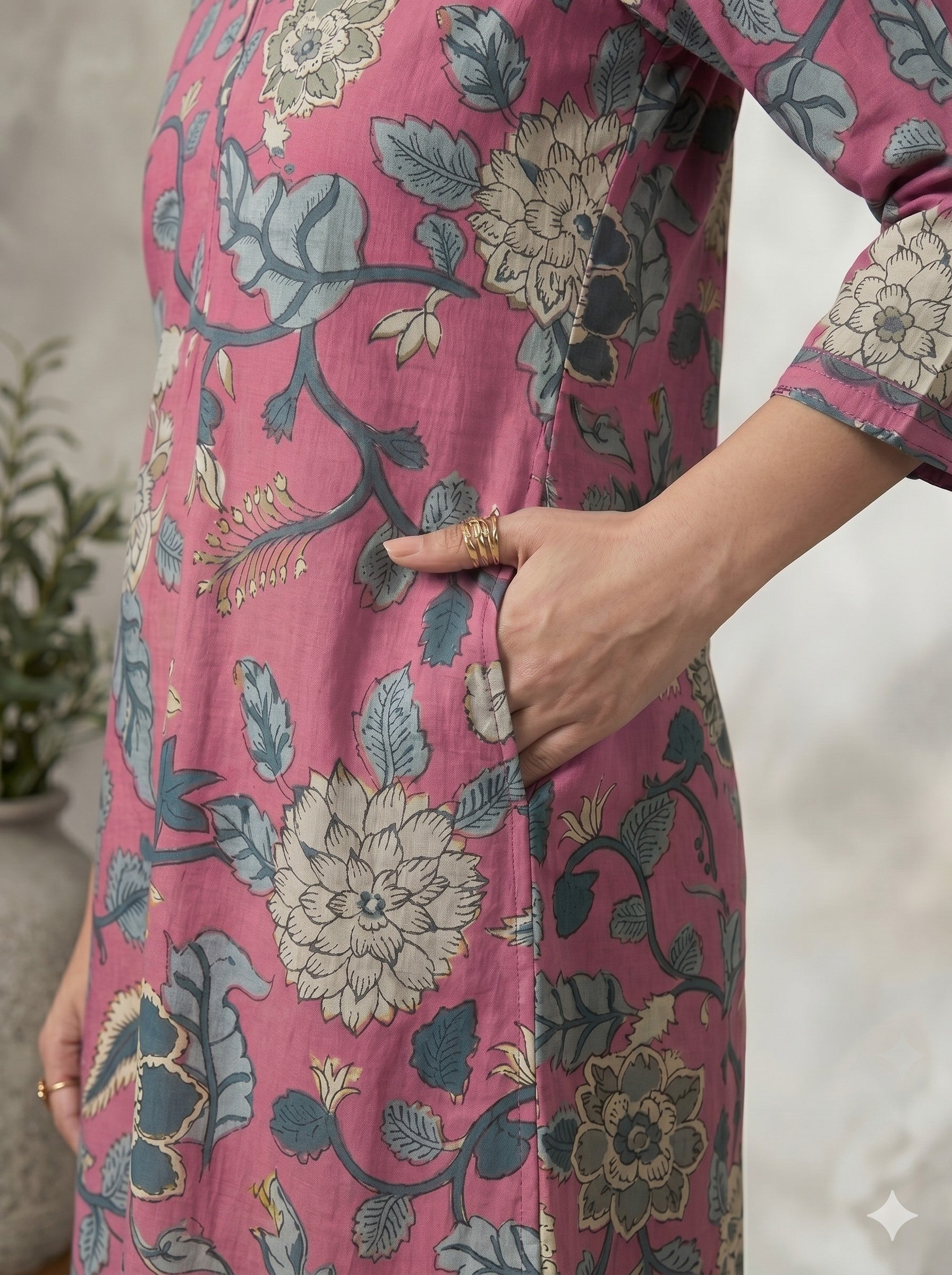 Pink A-Line Cotton Ethnic Floral Print Kurta with Stylish Neck Detailing.