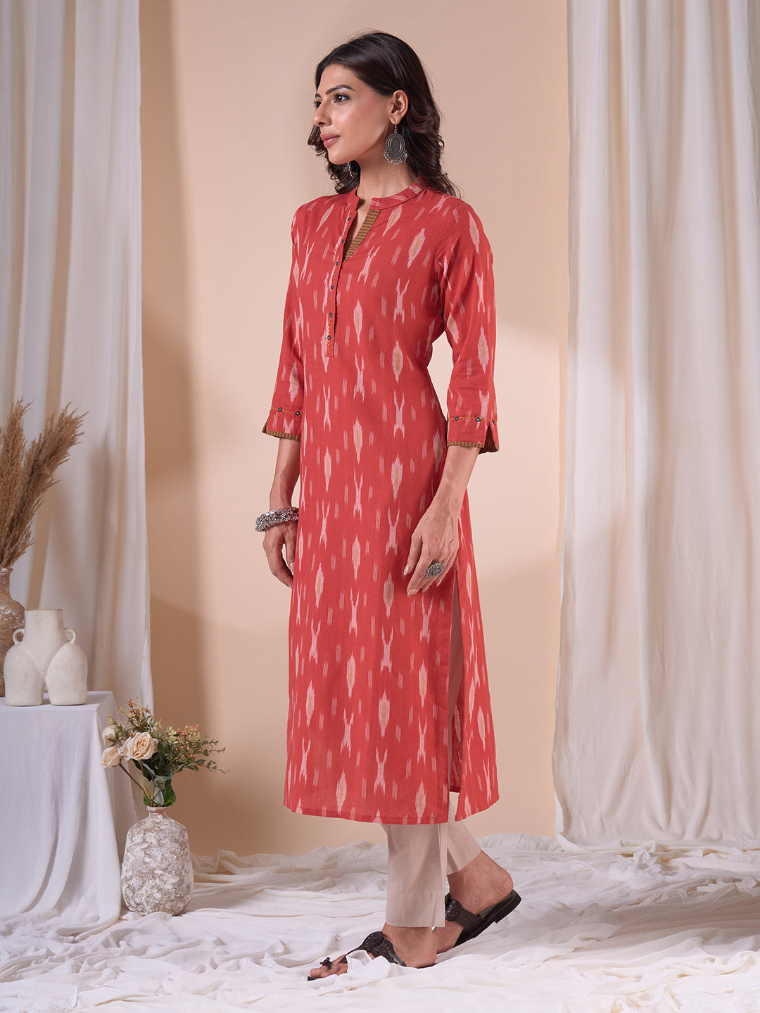 Straight Fit Cotton Ikat Weave Kurta with Checkered Trim & Handwork Detailing.