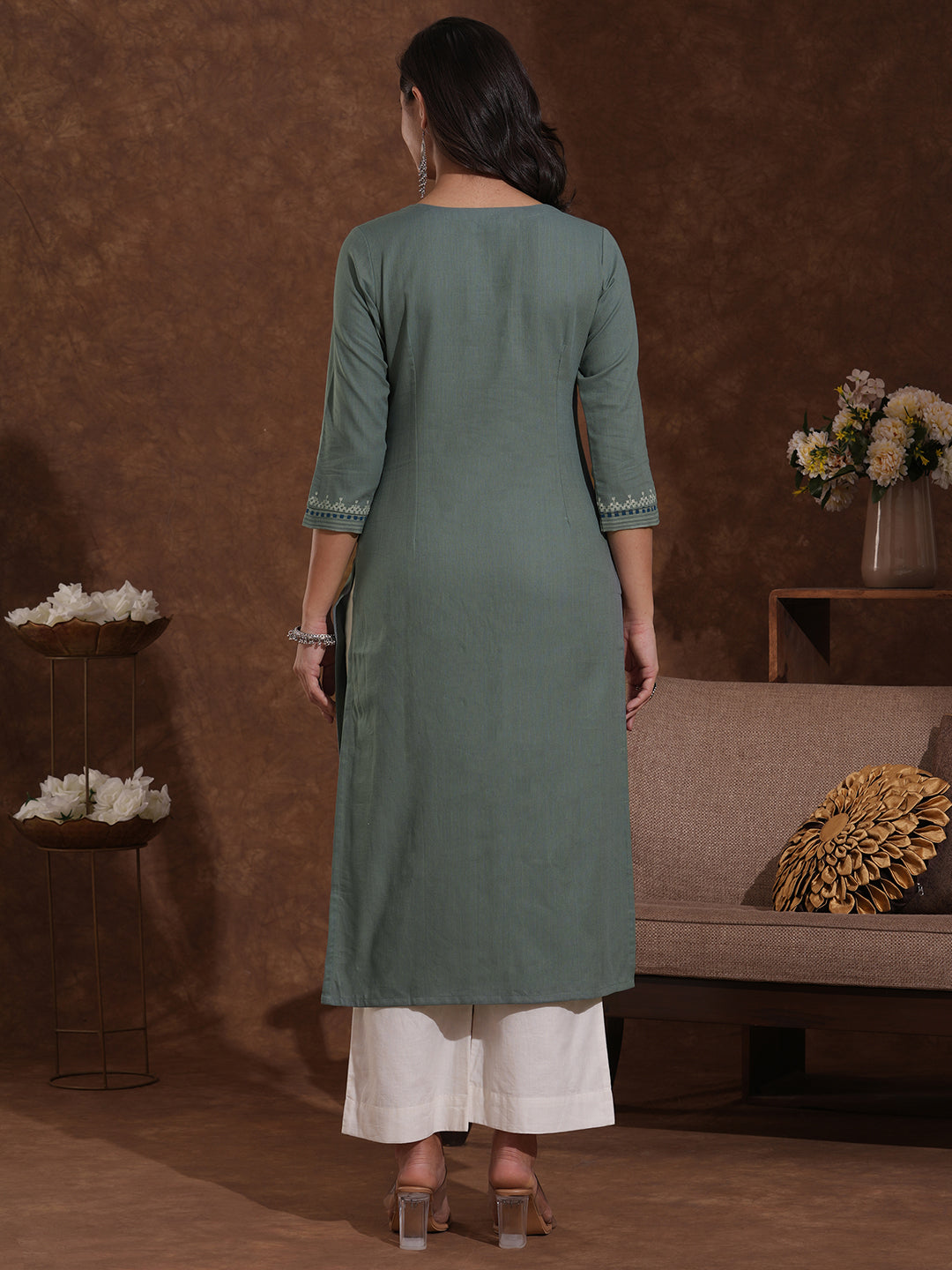 Straight fit kurta with block printed striped yoke and block printed striped cuff.