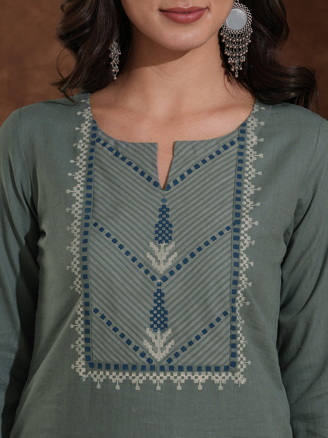 Straight fit kurta with block printed striped yoke and block printed striped cuff.