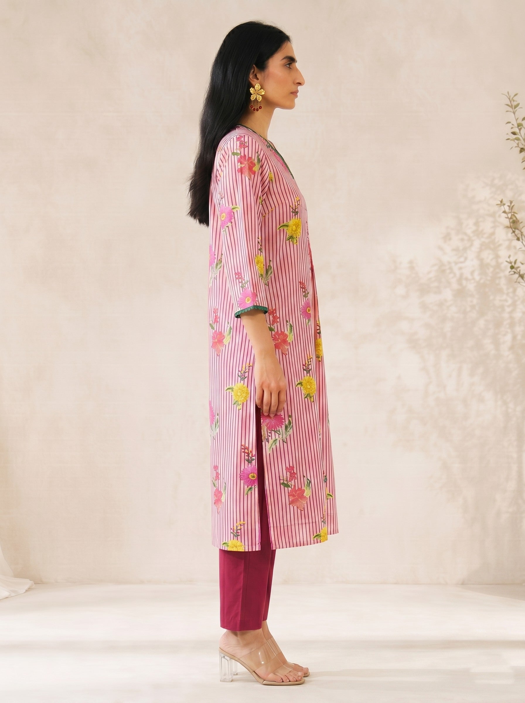 JOYLAND-Printed A-line Cambric kurta with center box pleat, bell sleeves and piping on neck and sleeves with beads.