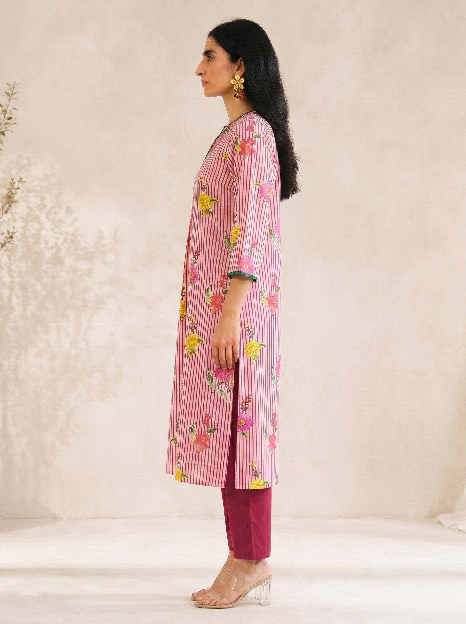 JOYLAND-Printed A-line Cambric kurta with center box pleat, bell sleeves and piping on neck and sleeves with beads.