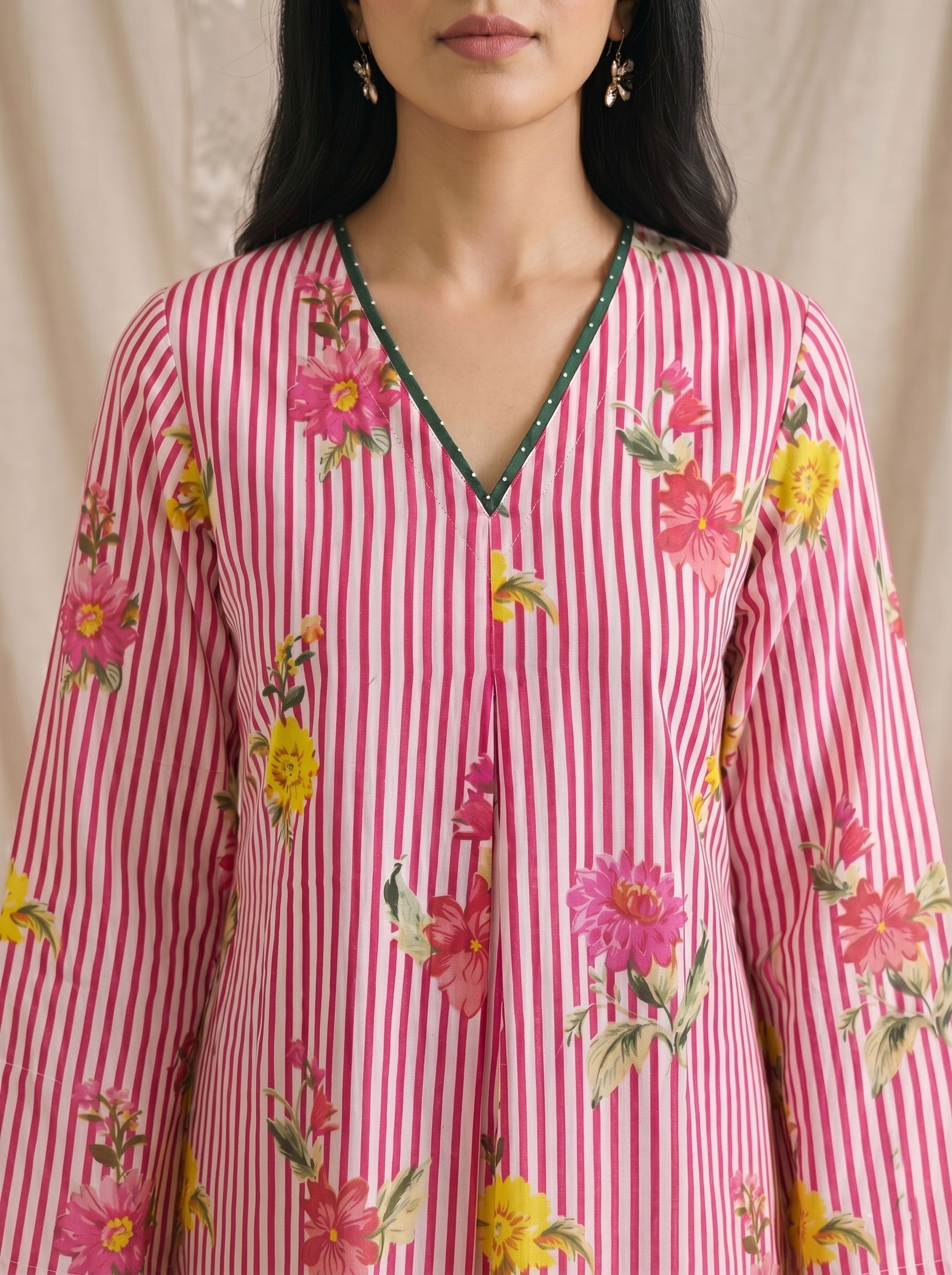 JOYLAND-Printed A-line Cambric kurta with center box pleat, bell sleeves and piping on neck and sleeves with beads.