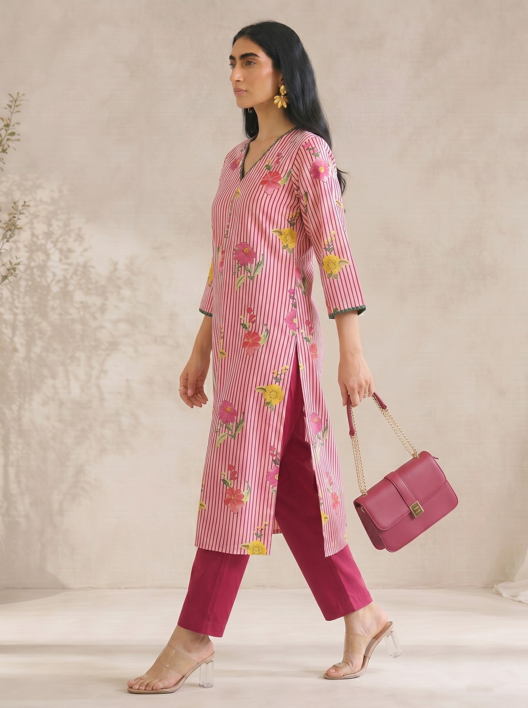JOYLAND-Printed A-line Cambric kurta with center box pleat, bell sleeves and piping on neck and sleeves with beads.