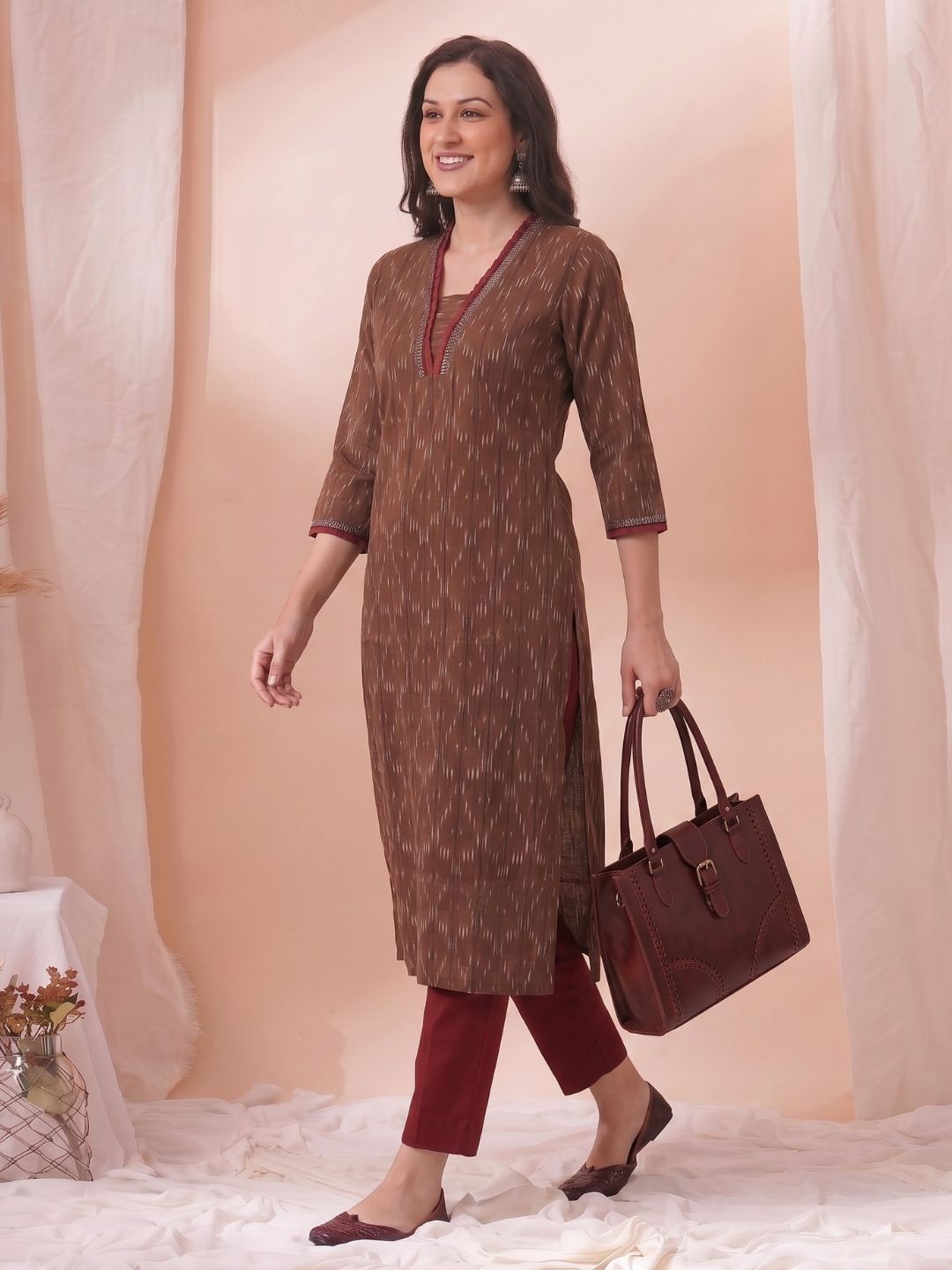 Straight Fit Ikat Kurta with Featuring Woven Stripes, Handwork & Solid Trim.