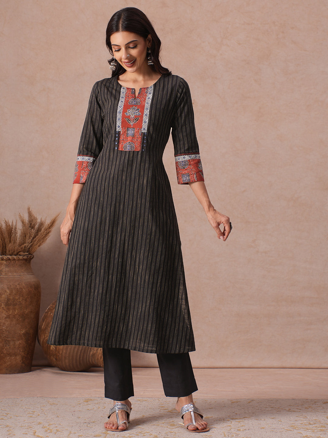 A-Line Woven Kurta with Printed Yoke, Cuffs, Checks Trim and Handwork Detail.