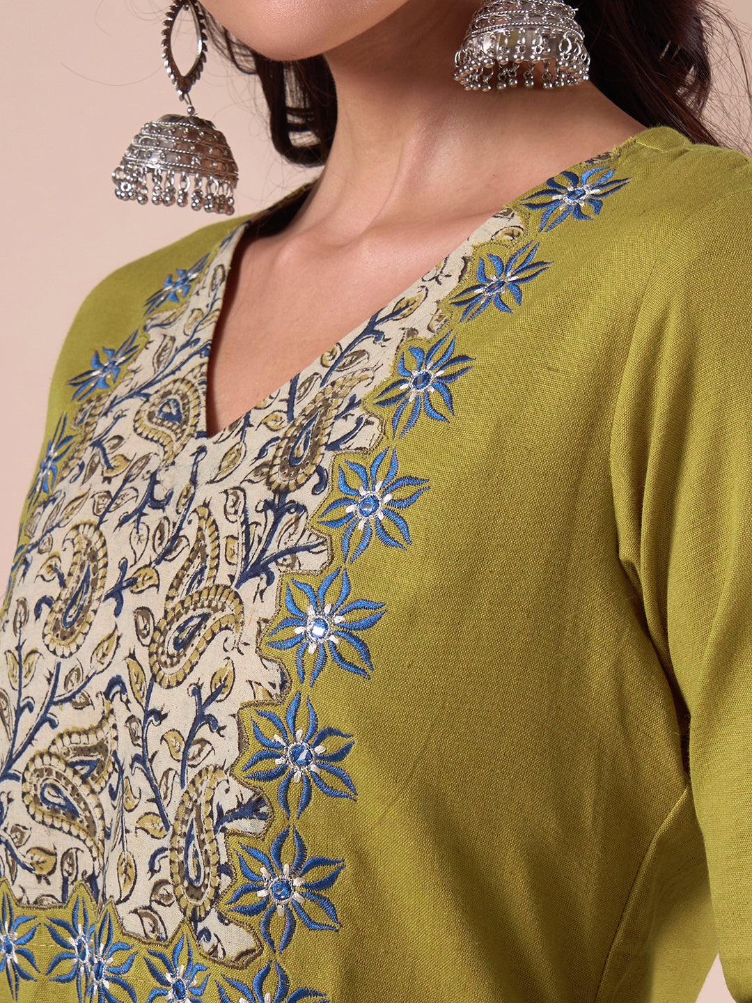 Straight Fit Cotton Kurta with Kalamkari Cutwork Yoke, Floral Embroidery and Sleeves.