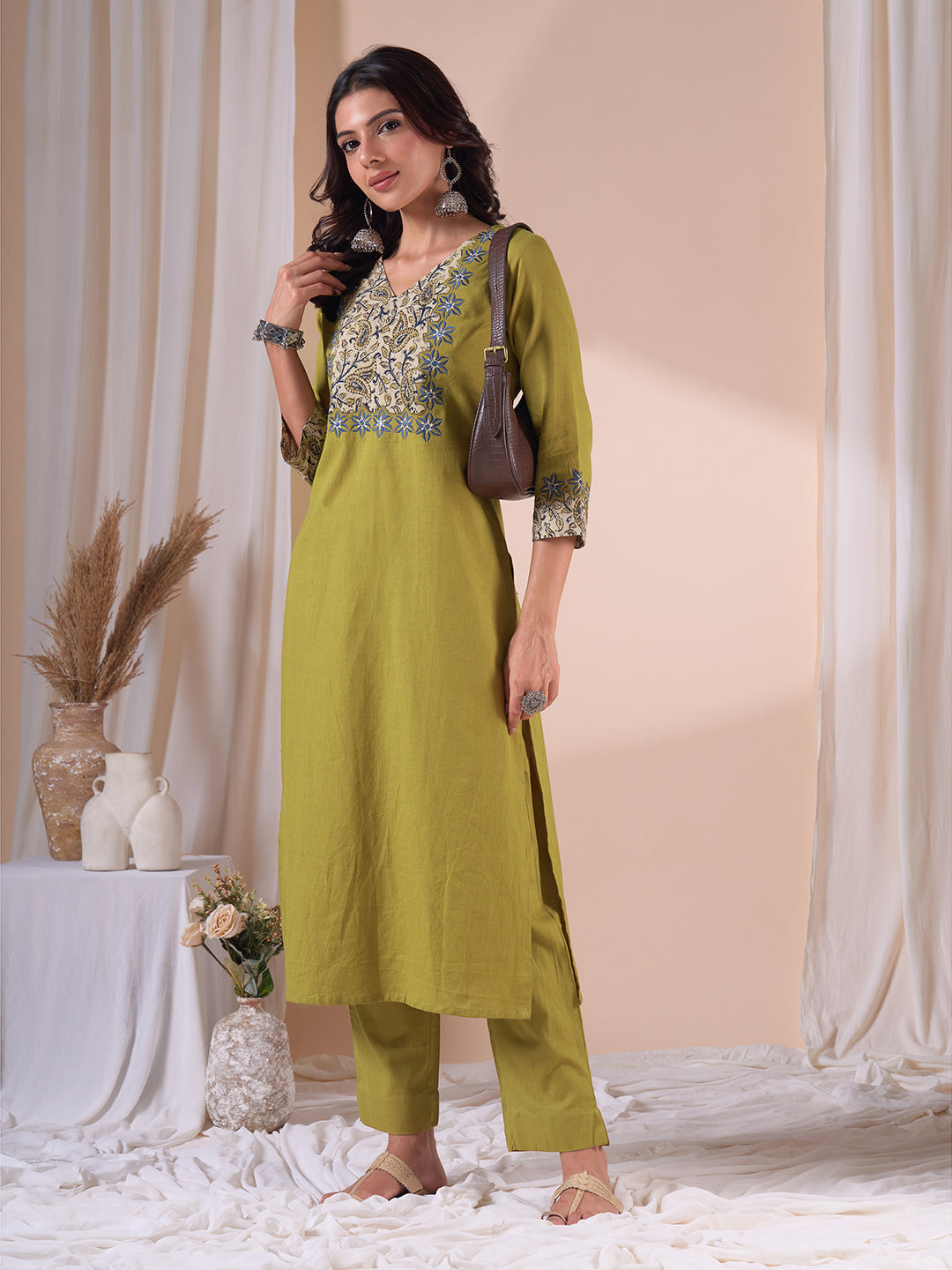Cotton Straight Fit Kurta Set with Kalamkari Cutwork Yoke and Matching Pants.