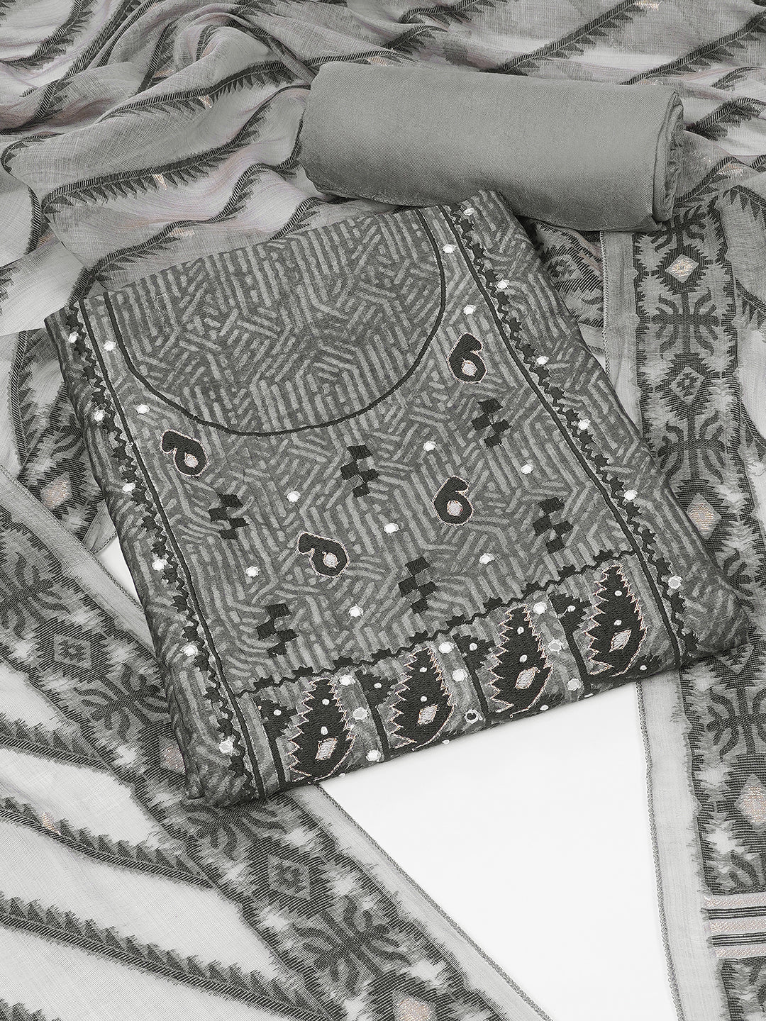 Elegant unstitched dress material in premium Chanderi fabric with ethnic motifs and handwork accents.