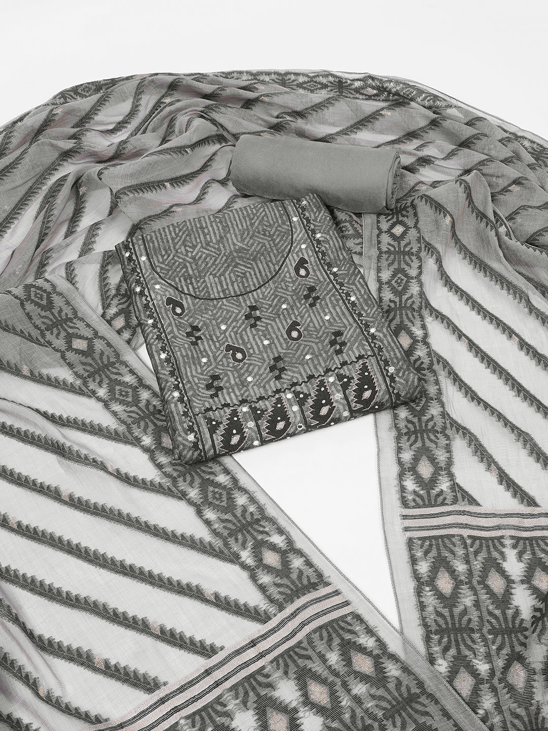 Elegant unstitched dress material in premium Chanderi fabric with ethnic motifs and handwork accents.