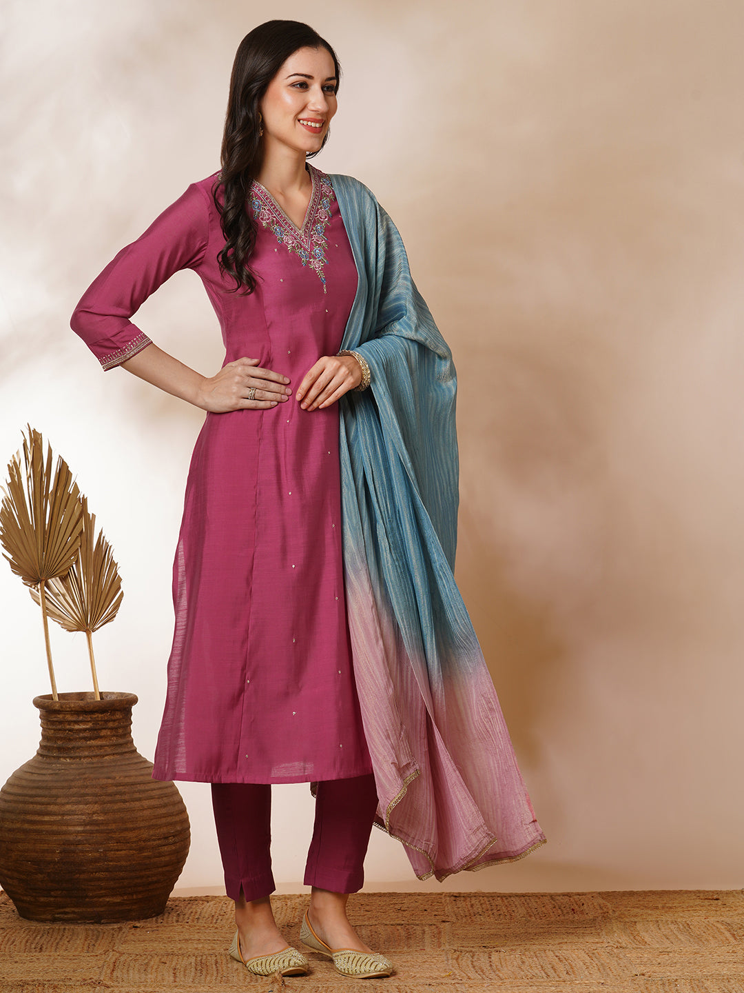 Party Edit- A-line kurta in silk blend fabric with embroidery detailing paired with lined silk blend pants and shaded tissue dupatta