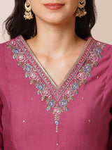 Party Edit- A-line kurta in silk blend fabric with embroidery detailing paired with lined silk blend pants and shaded tissue dupatta