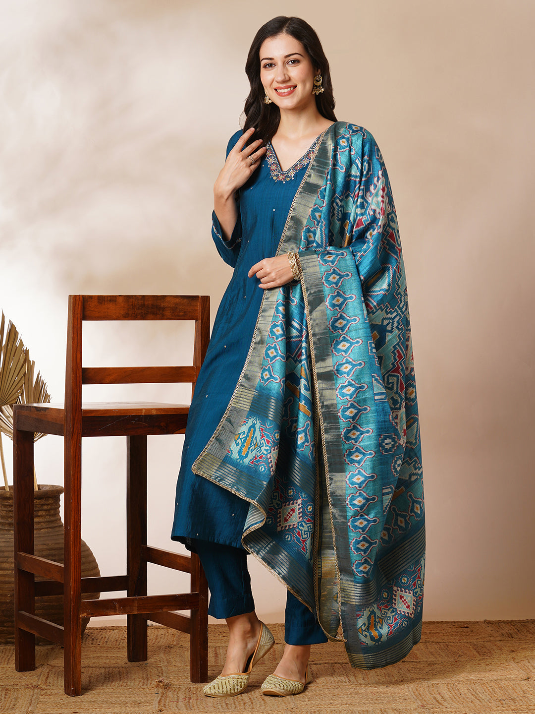 Party Edit- A-line silk blend kurta with zari embroidery detailing paired with printed dupatta and lined silk blend pants