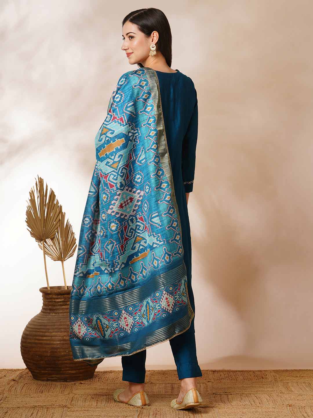 Party Edit- A-line silk blend kurta with zari embroidery detailing paired with printed dupatta and lined silk blend pants