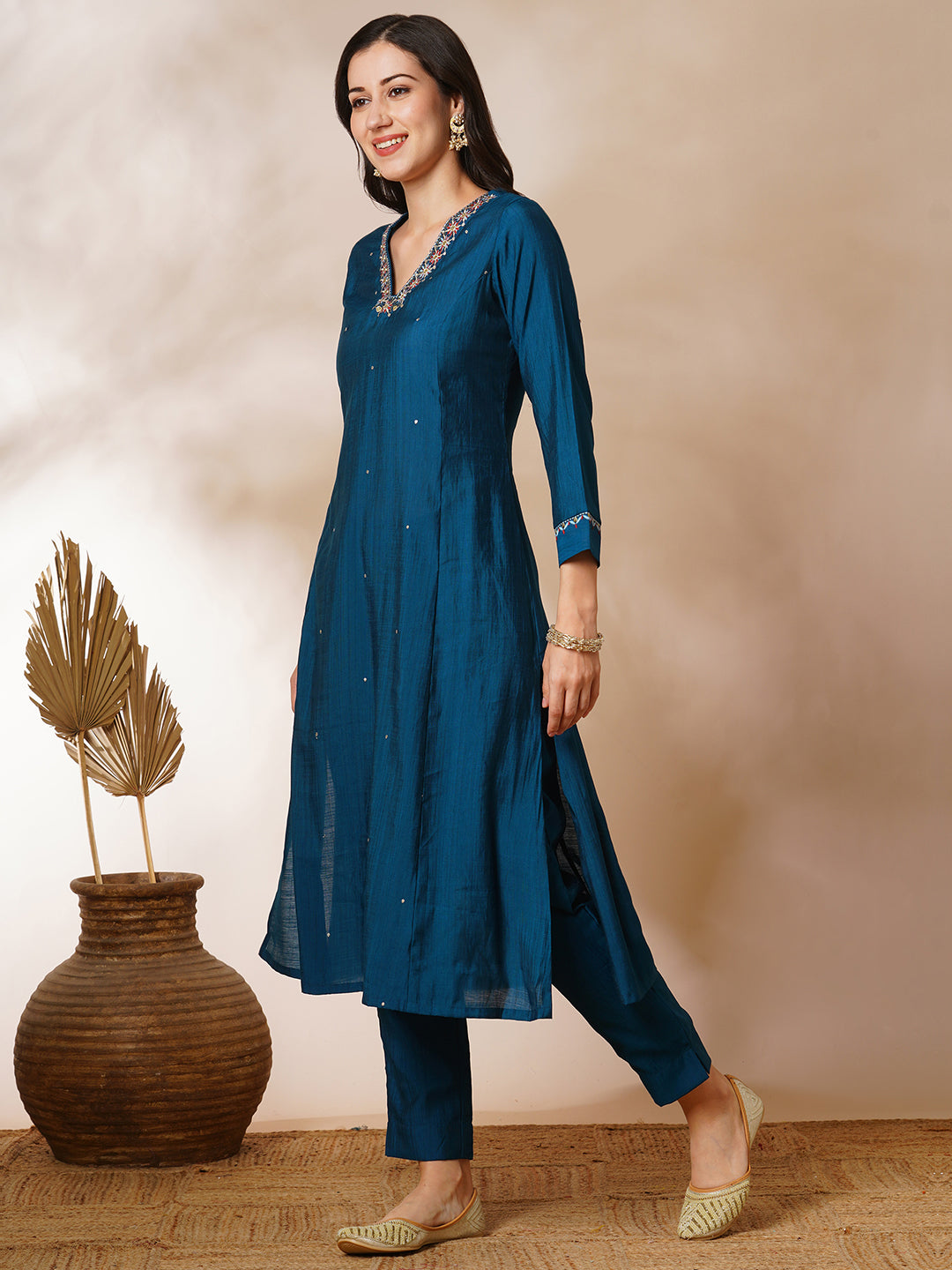 Party Edit- A-line silk blend kurta with zari embroidery detailing paired with printed dupatta and lined silk blend pants