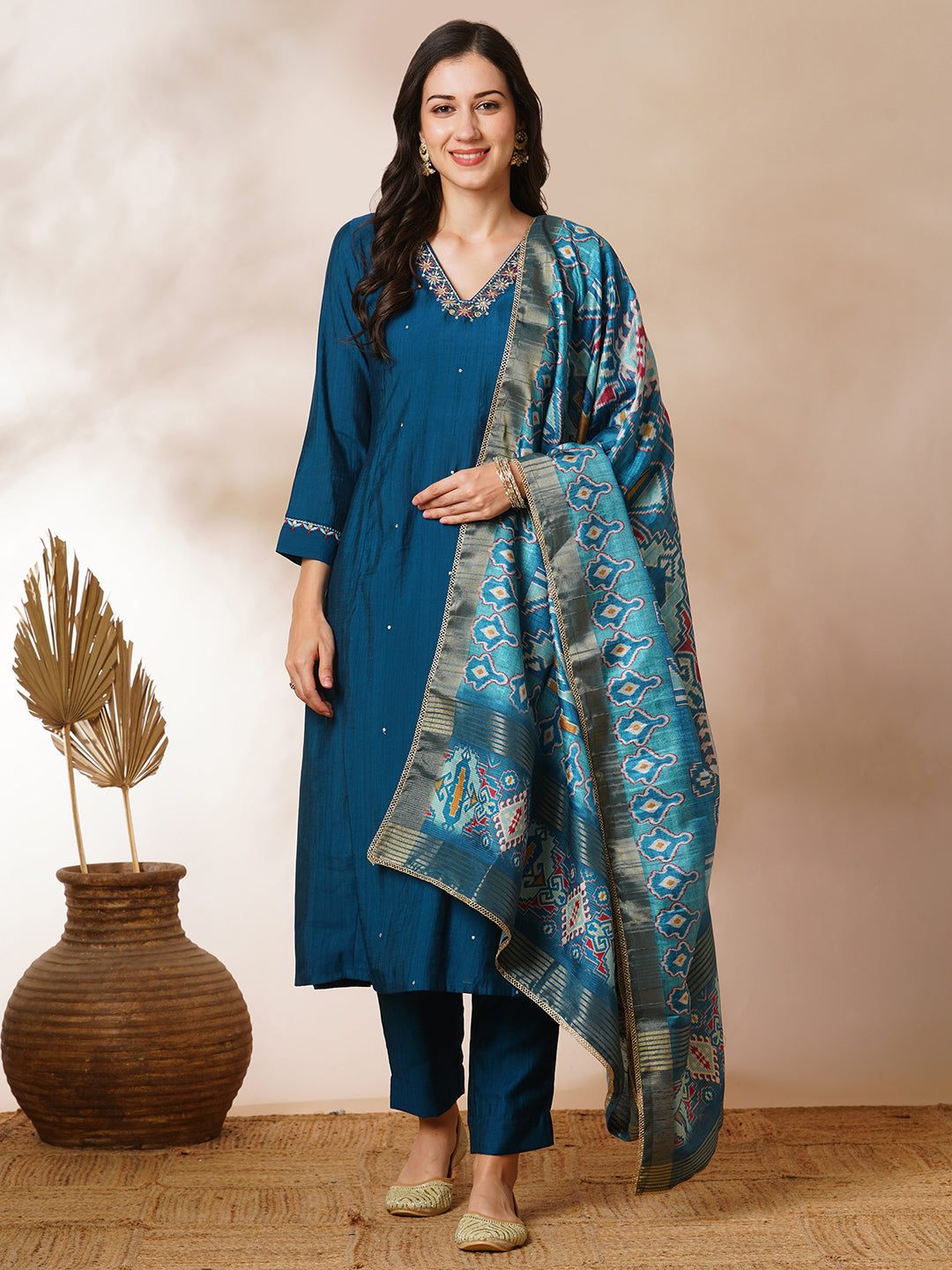 Party Edit- A-line silk blend kurta with zari embroidery detailing paired with printed dupatta and lined silk blend pants