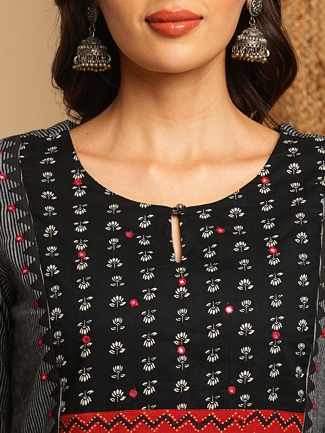 Plus Size A-Line kurta highlighted with the Contrast color hand mirrors.