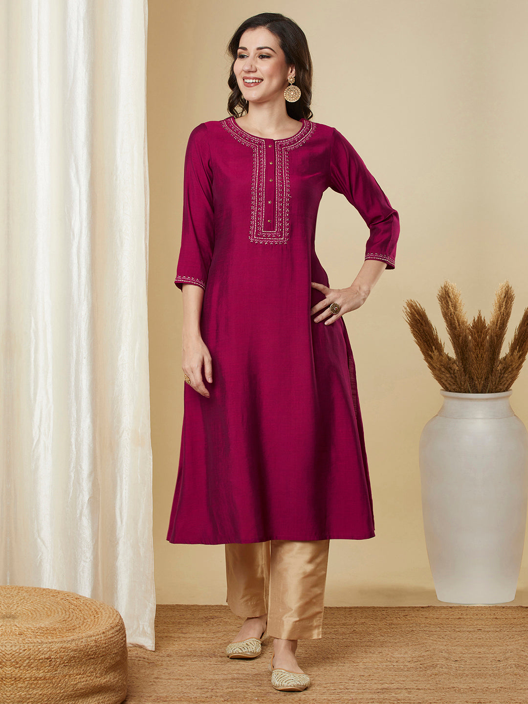 Party Edit- Flared pink avani silk kurta with heavy embroidery on neck around the placket