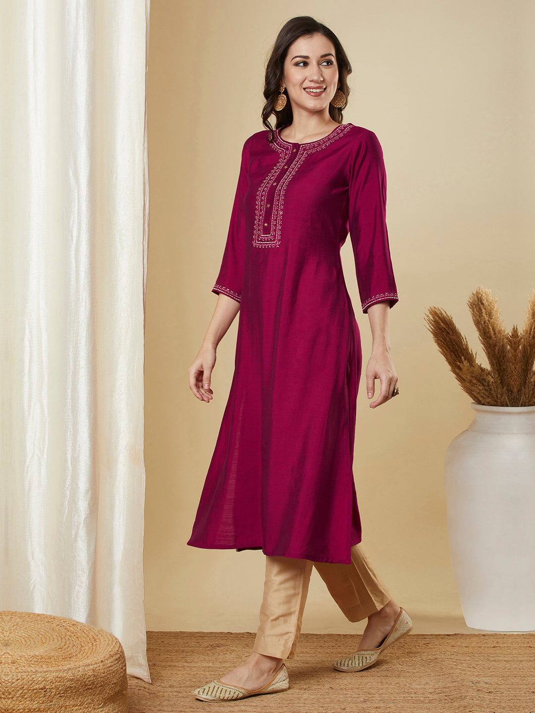 Party Edit- Flared pink avani silk kurta with heavy embroidery on neck around the placket