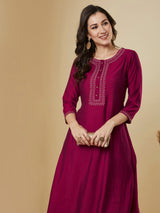 Party Edit- Flared pink avani silk kurta with heavy embroidery on neck around the placket