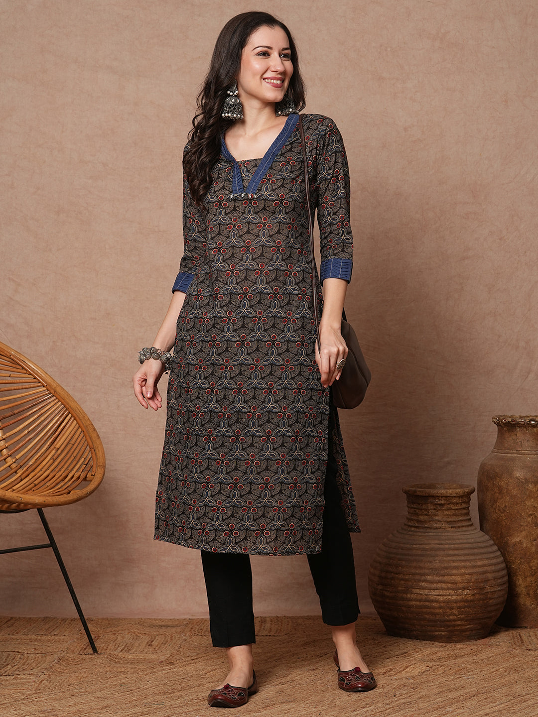 Straight fit printed kurta with contrast fabric smocking on neckline and cuff and silver trims