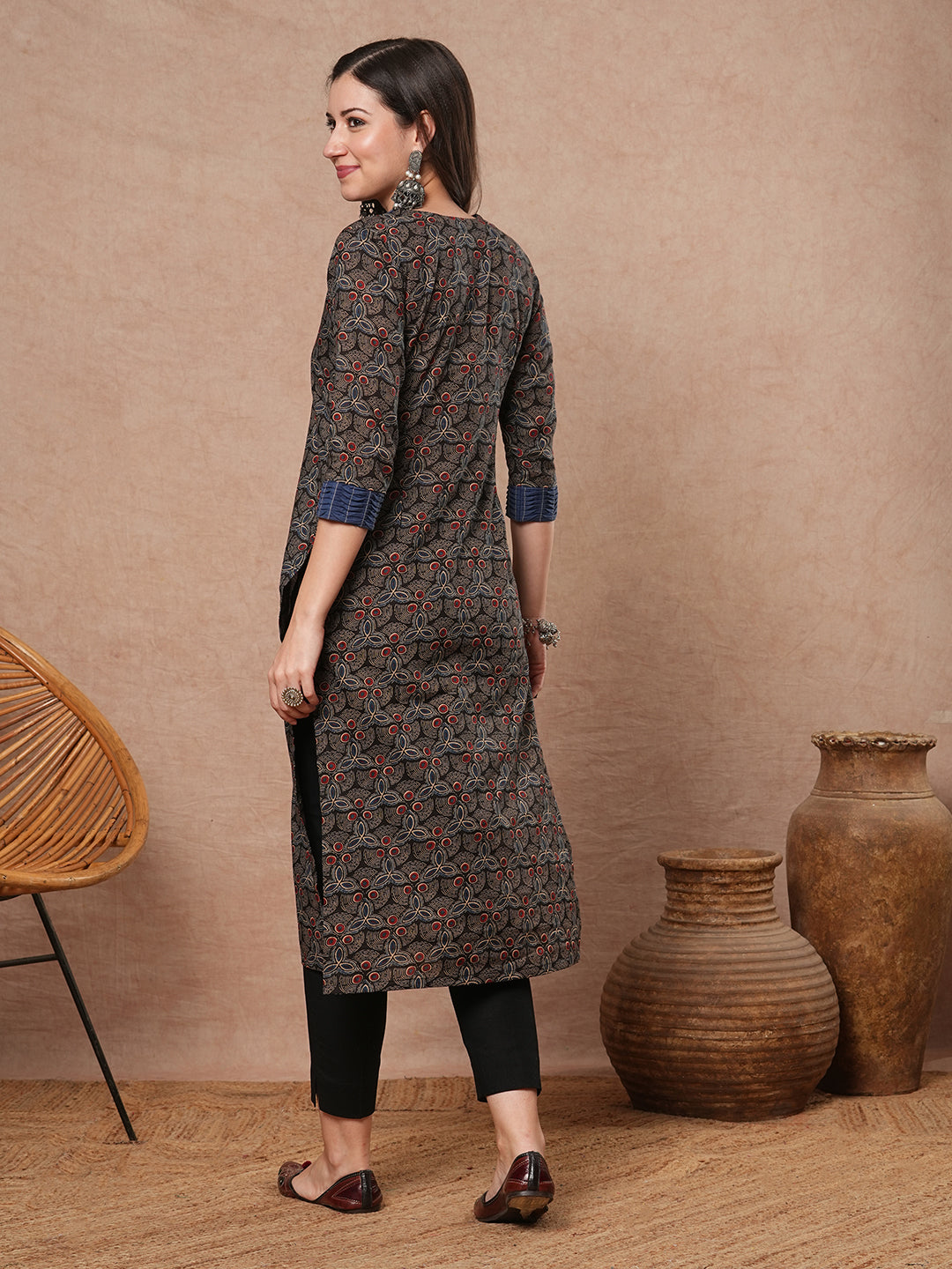 Straight fit printed kurta with contrast fabric smocking on neckline and cuff and silver trims
