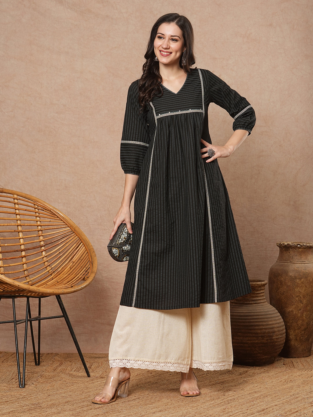A-line shoulder princess kurta with under-bust gathers with contrast fabric trims and handwork