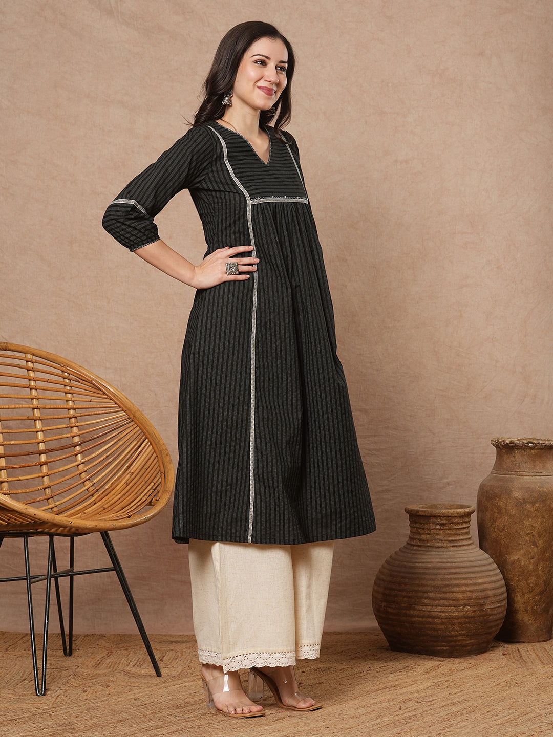 A-line shoulder princess kurta with under-bust gathers with contrast fabric trims and handwork
