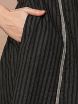 A-line shoulder princess kurta with under-bust gathers with contrast fabric trims and handwork