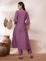 Party Edit- Pocketed A line kurta adorned with zari embroidery and paired with lined silk blend pants