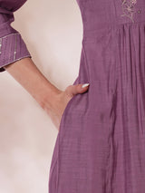 Party Edit- Pocketed A line kurta adorned with zari embroidery and paired with lined silk blend pants