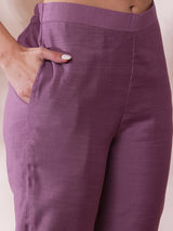 Party Edit- Pocketed A line kurta adorned with zari embroidery and paired with lined silk blend pants