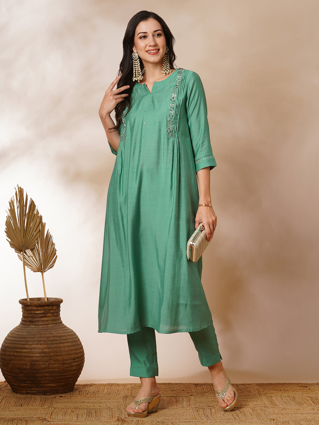 Party Edit- Pleated A-line silk blend kurta with embroidery and pocket, paired with lined silk blend pants