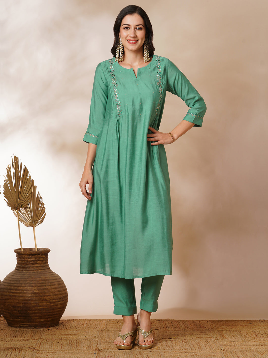 Party Edit- Pleated A-line silk blend kurta with embroidery and pocket, paired with lined silk blend pants