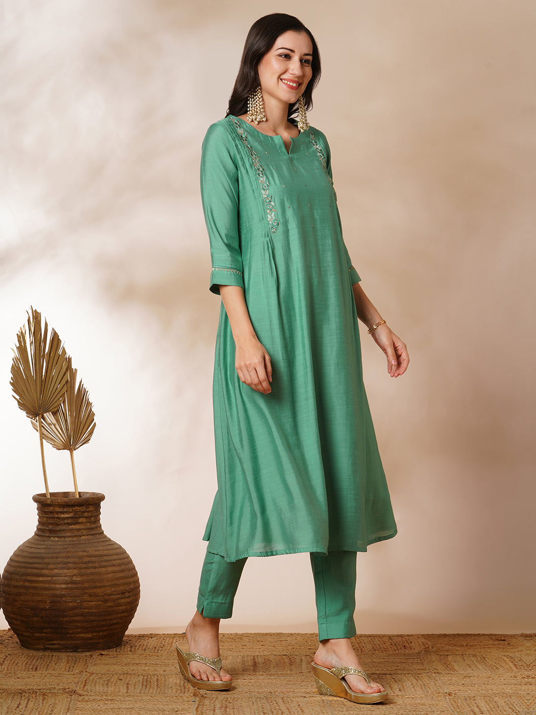 Party Edit- Pleated A-line silk blend kurta with embroidery and pocket, paired with lined silk blend pants