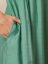 Party Edit- Pleated A-line silk blend kurta with embroidery and pocket, paired with lined silk blend pants