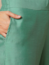 Party Edit- Pleated A-line silk blend kurta with embroidery and pocket, paired with lined silk blend pants