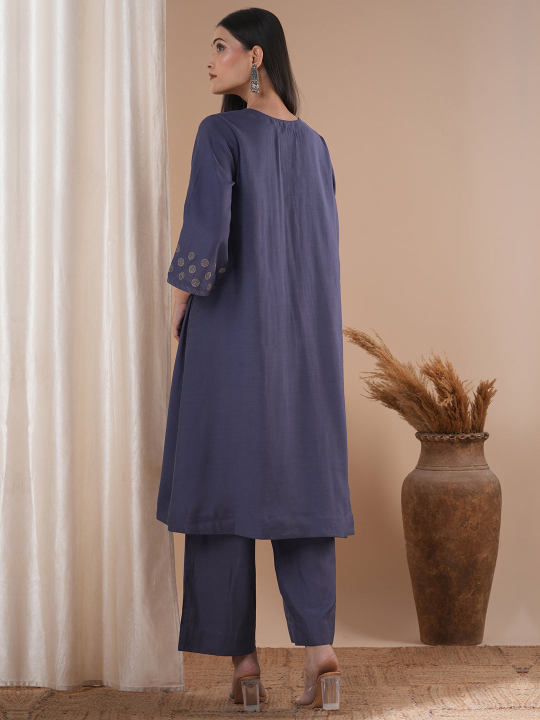 Party Edit- Paneled A line kurta with embroidery paired with lined palazzo in silk blend fabric.