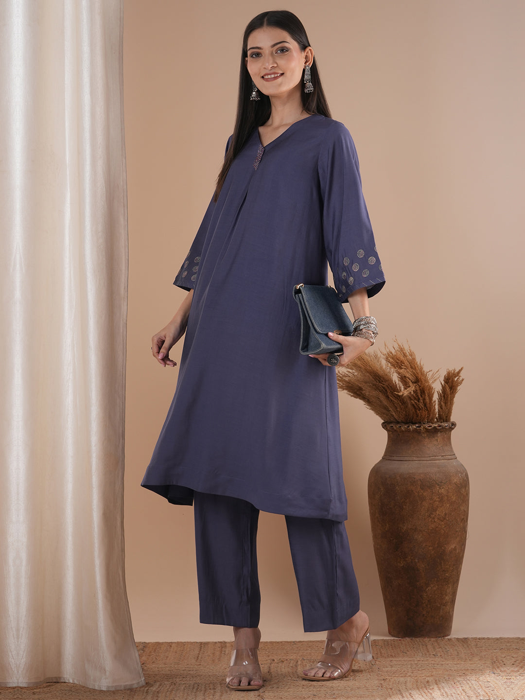 Party Edit- Paneled A line kurta with embroidery paired with lined palazzo in silk blend fabric.