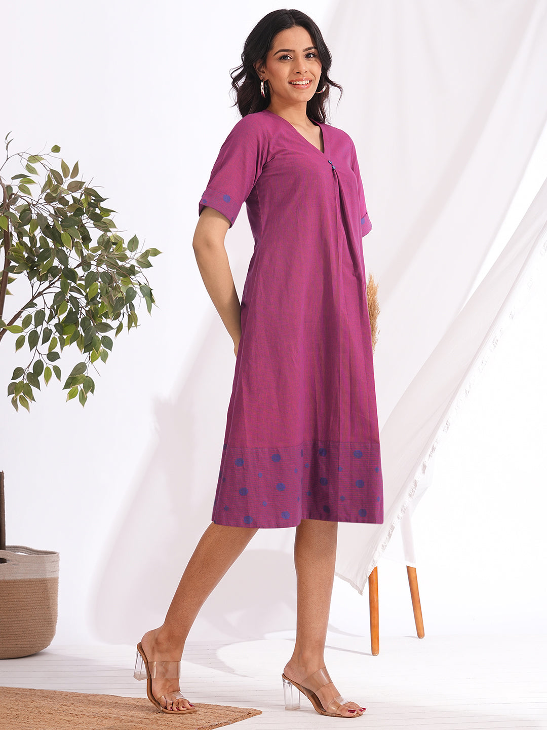 A-line dress in woven cotton stripe fabric with a centre box pleat and attached buttons