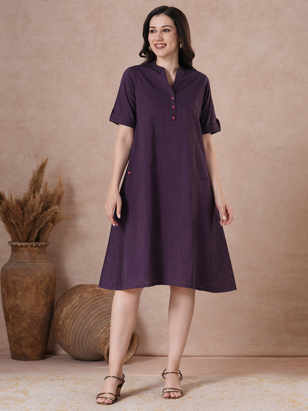 JOYLAND - Cotton striped Tent Fit Shirt Dress with Dual pockets and button accents.