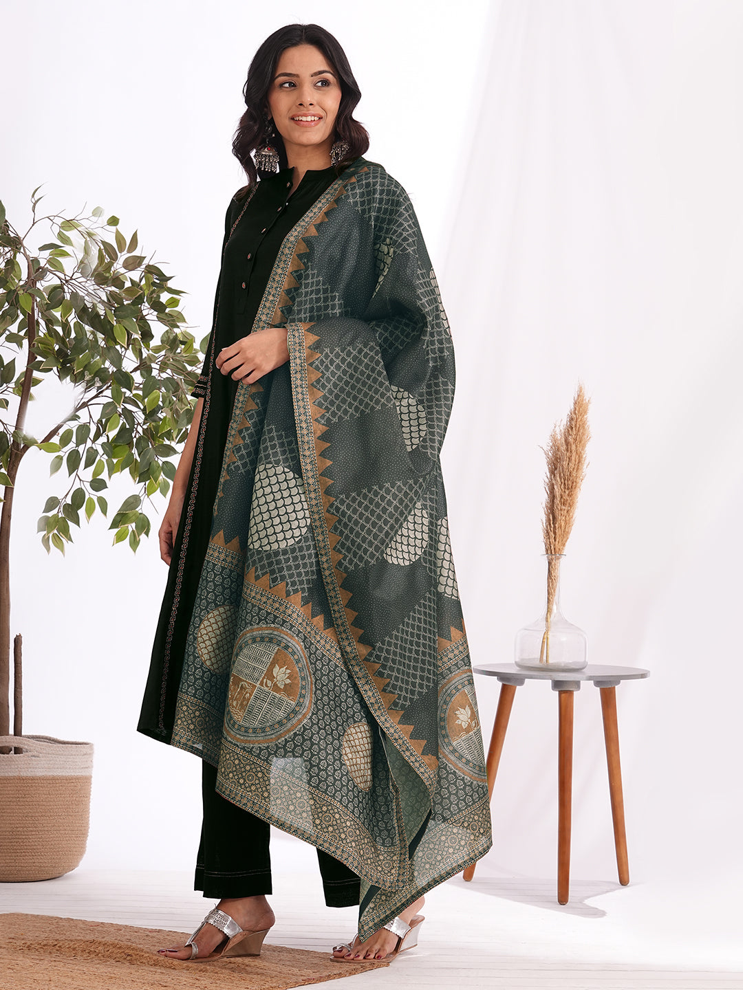 A-Line embroidered silk blend three piece set with an printed dupatta and lined palazzo.