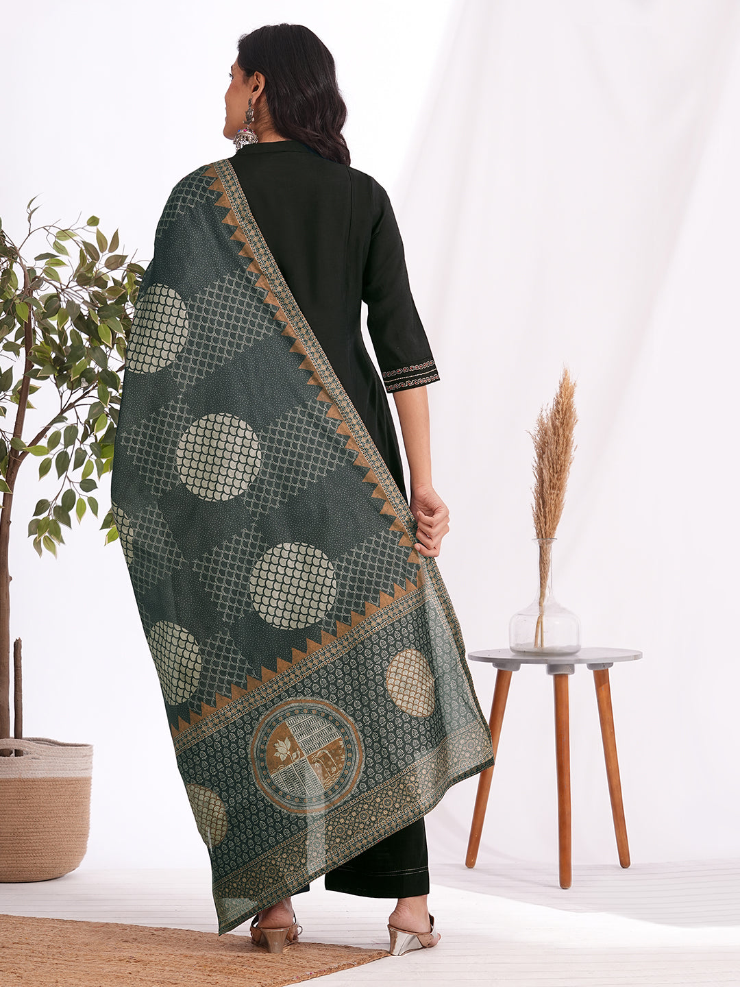 A-Line embroidered silk blend three piece set with an printed dupatta and lined palazzo.