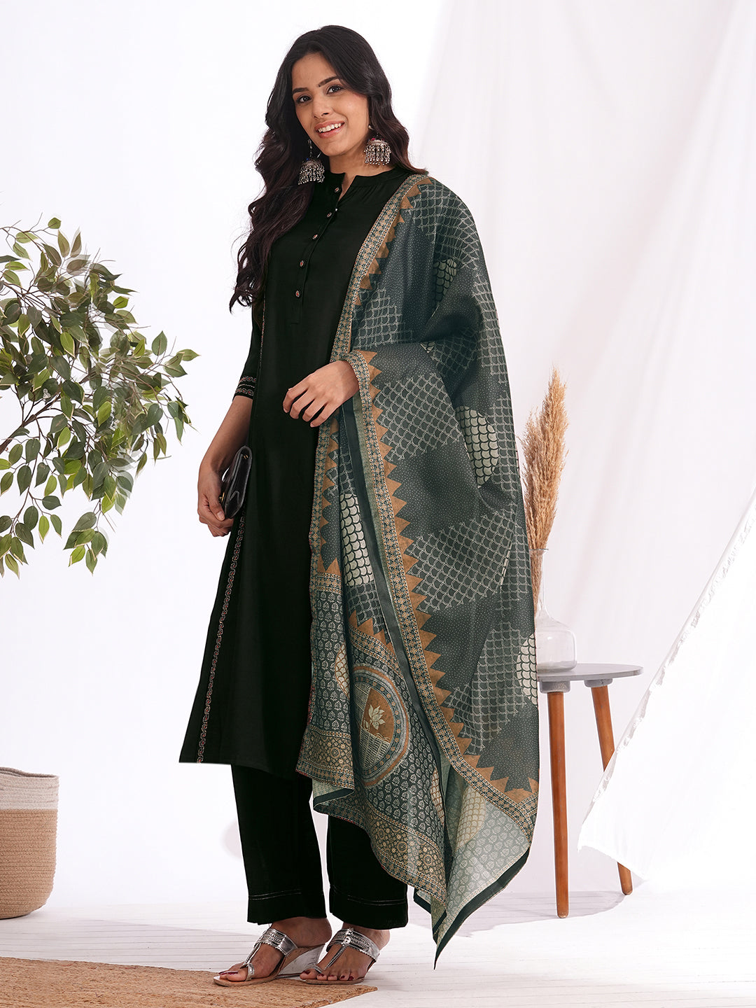 A-Line embroidered silk blend three piece set with an printed dupatta and lined palazzo.