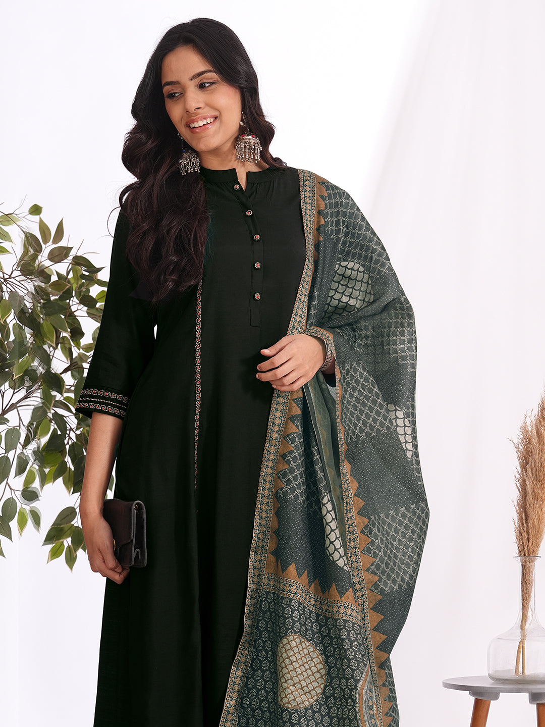 A-Line embroidered silk blend three piece set with an printed dupatta and lined palazzo.
