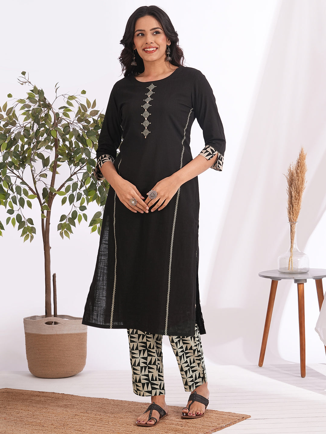 Straight fit suit set features a cotton block printed top adorned with a printed bottom & printed dupatta.