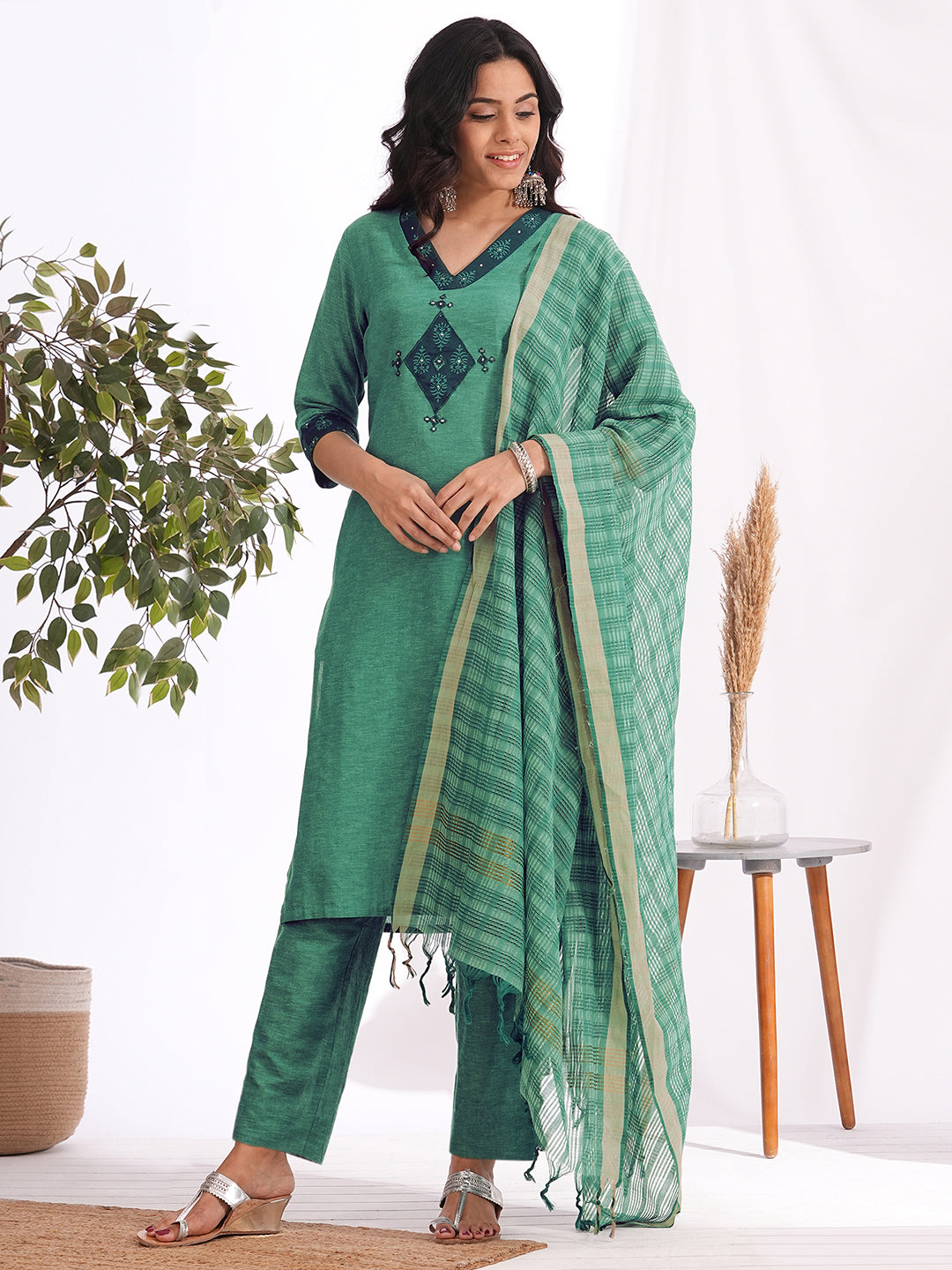 straight fit cotton embroidered suit set with a screen printed dupatta & self bottom.